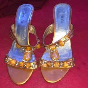 nice gold/orange heels, with nice little gemstones on them